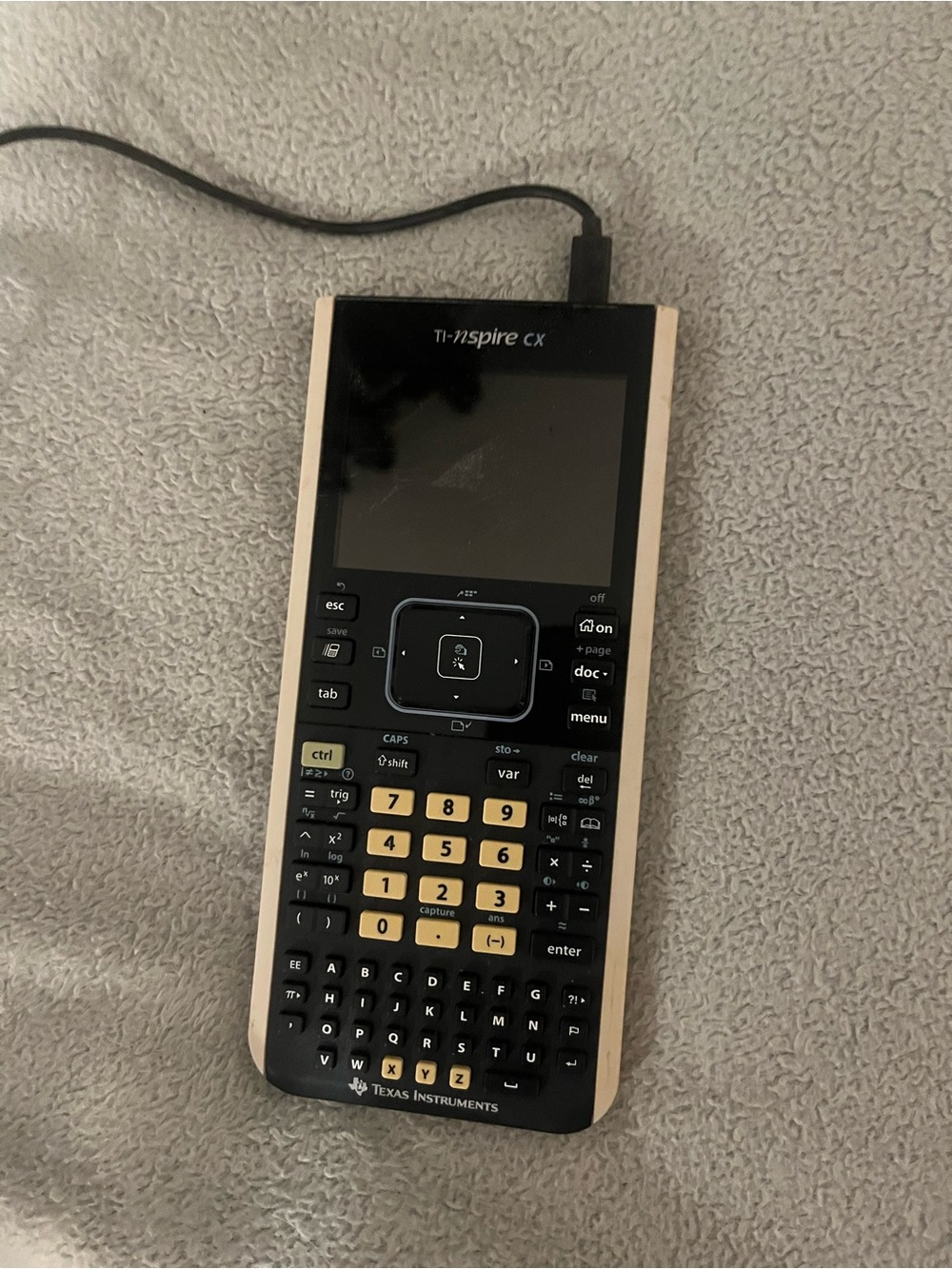 Texas Instruments TI-Nspire CX Graphing Calculator in Black and Gold Trim
